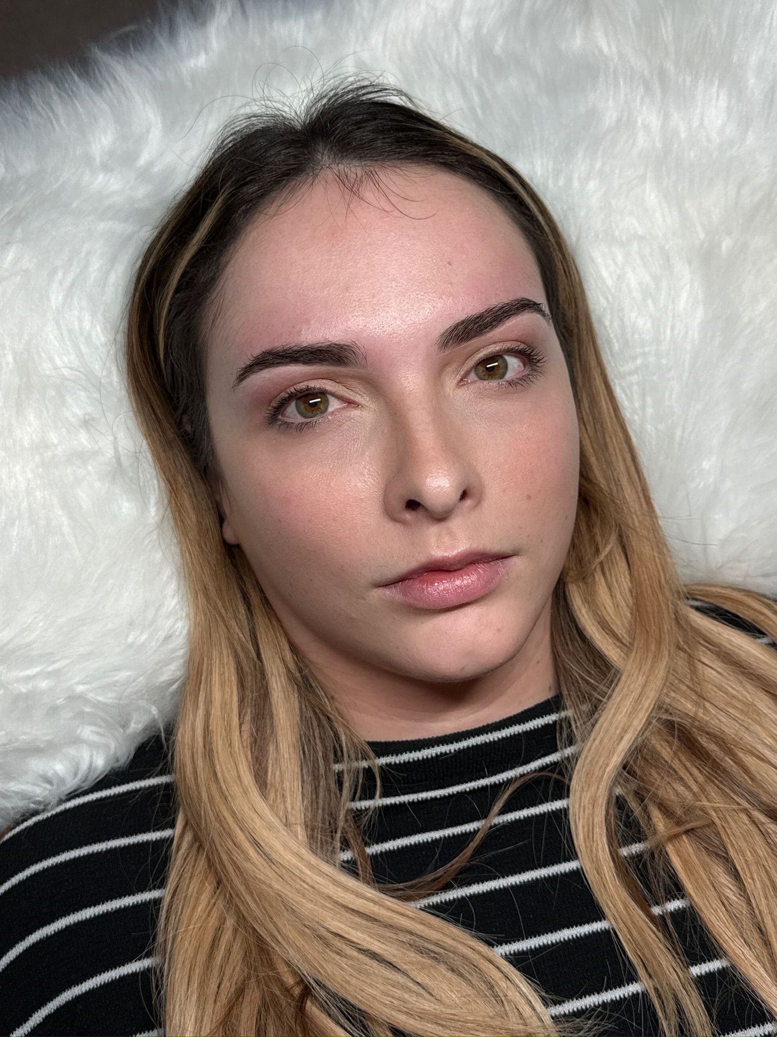 Client portrait with soft polished lashes and brows